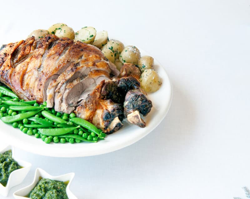 Garlic & Wine Glazed Roast Lamb with Mint Pesto Recipe - Omak Meats Butcher